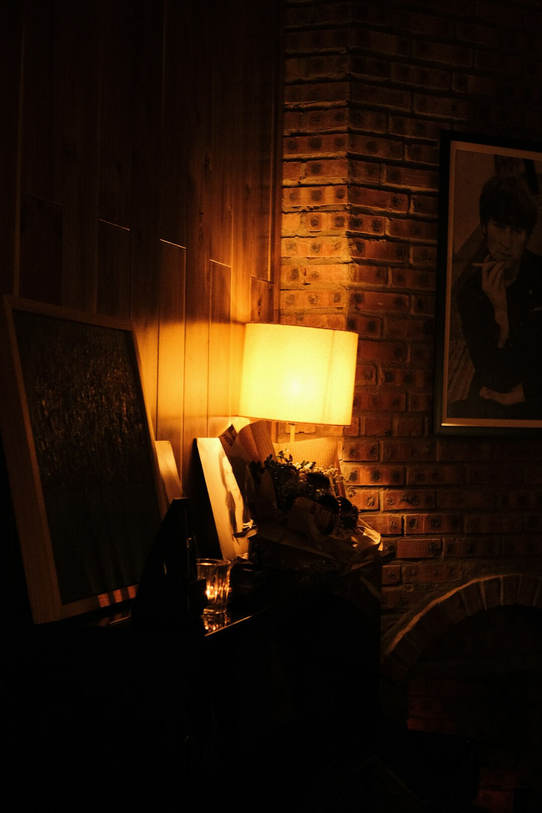 detective reading book by lamp