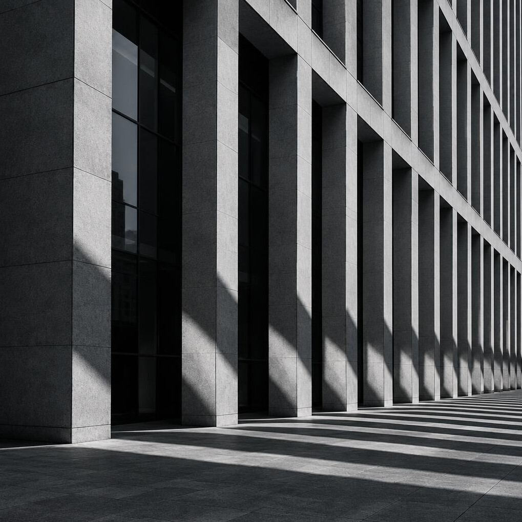 Architectural detail of a tall building with strong shadows